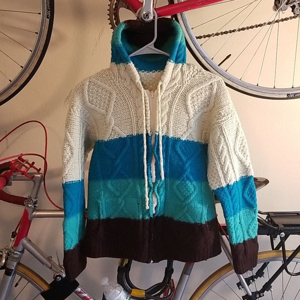 Knitted beautiful hipster sweater with hood